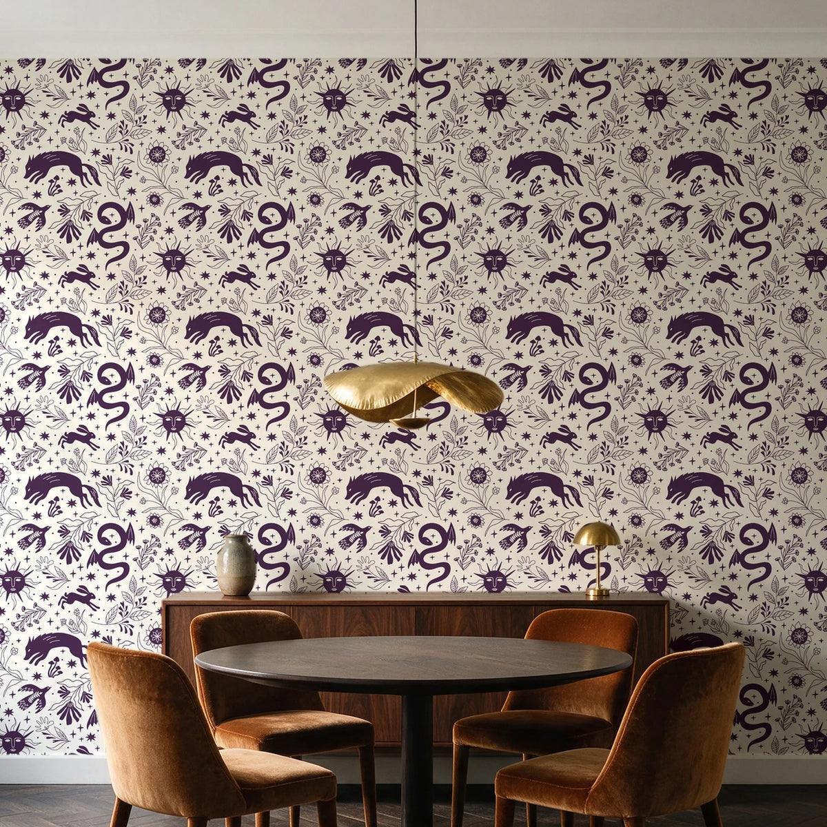 Sun & Moon Parchment celestial folk wallpaper behind a walnut credenza and round table in an elegant dining room
