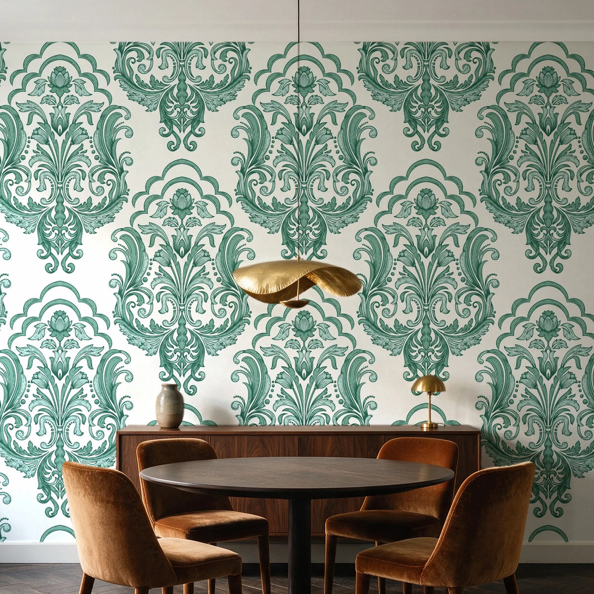 Sunlit Thicket Emerald damask wallpaper behind a walnut credenza and round table in an elegant dining room