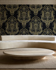 Sunlit Thicket Noir damask wallpaper in an elegant living room