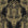 Sunlit Thicket Noir damask wallpaper in black and gold