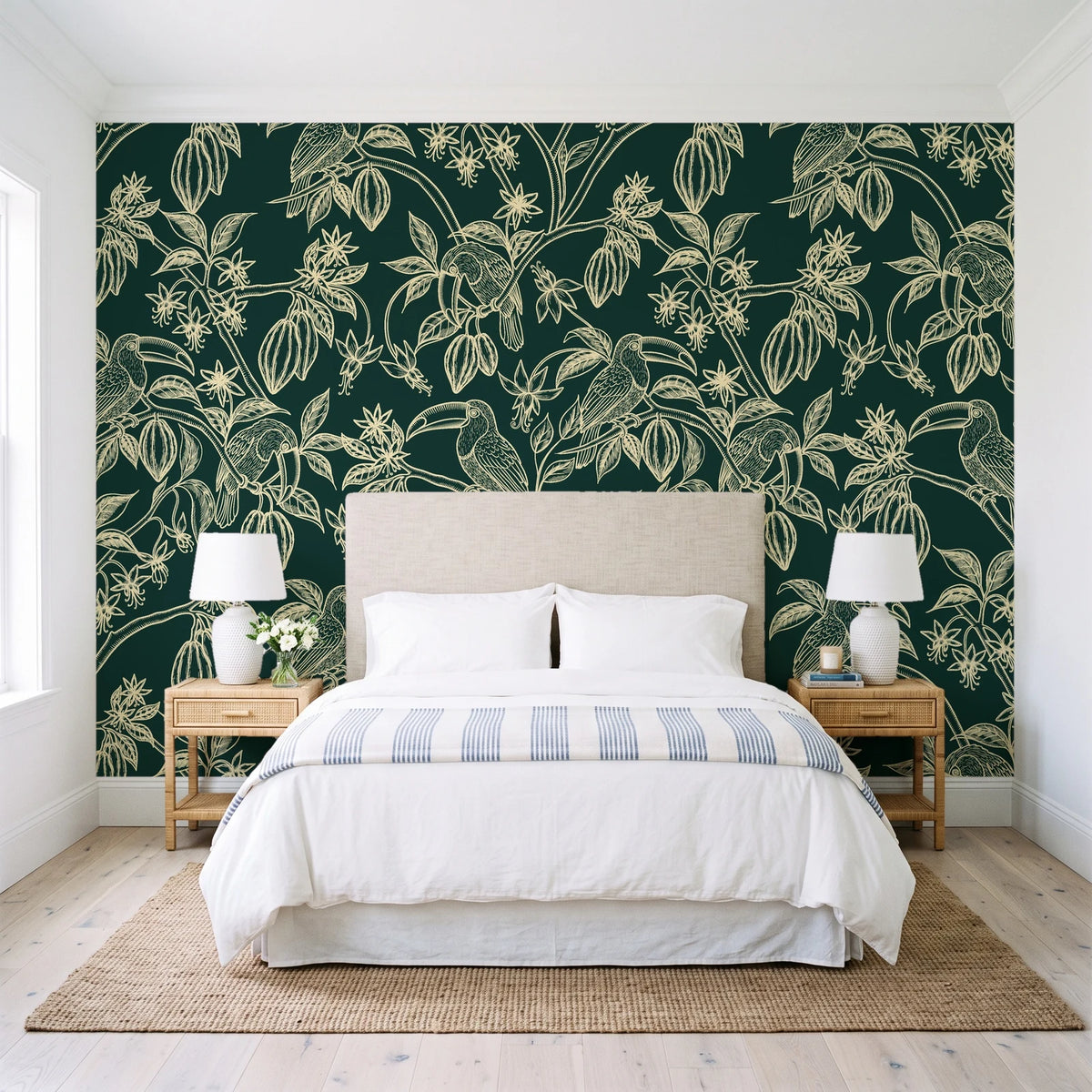 Toucan Toile Jungle tropical bird wallpaper behind a queen bed in a bright coastal bedroom