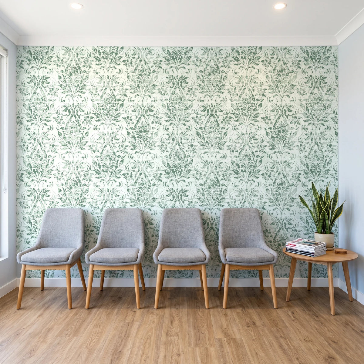 Tranquil Flora Sage floral damask wallpaper behind a row of upholstered chairs in a bright clinic waiting room