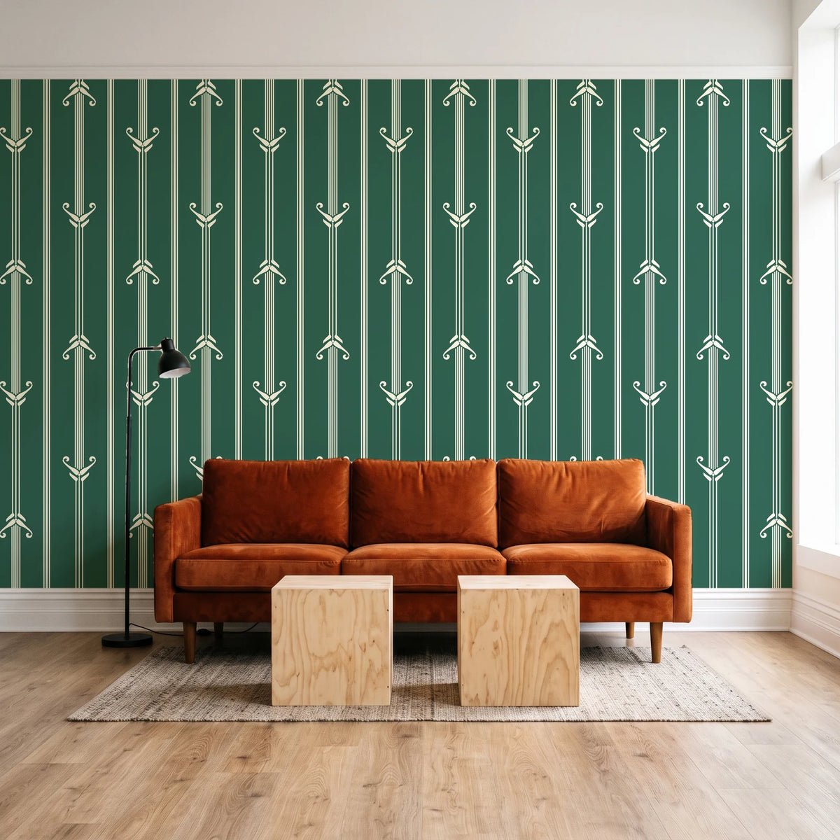 Tranquility Tapestry Emerald art deco stripe wallpaper behind a rust velvet sofa in a bright coworking lounge