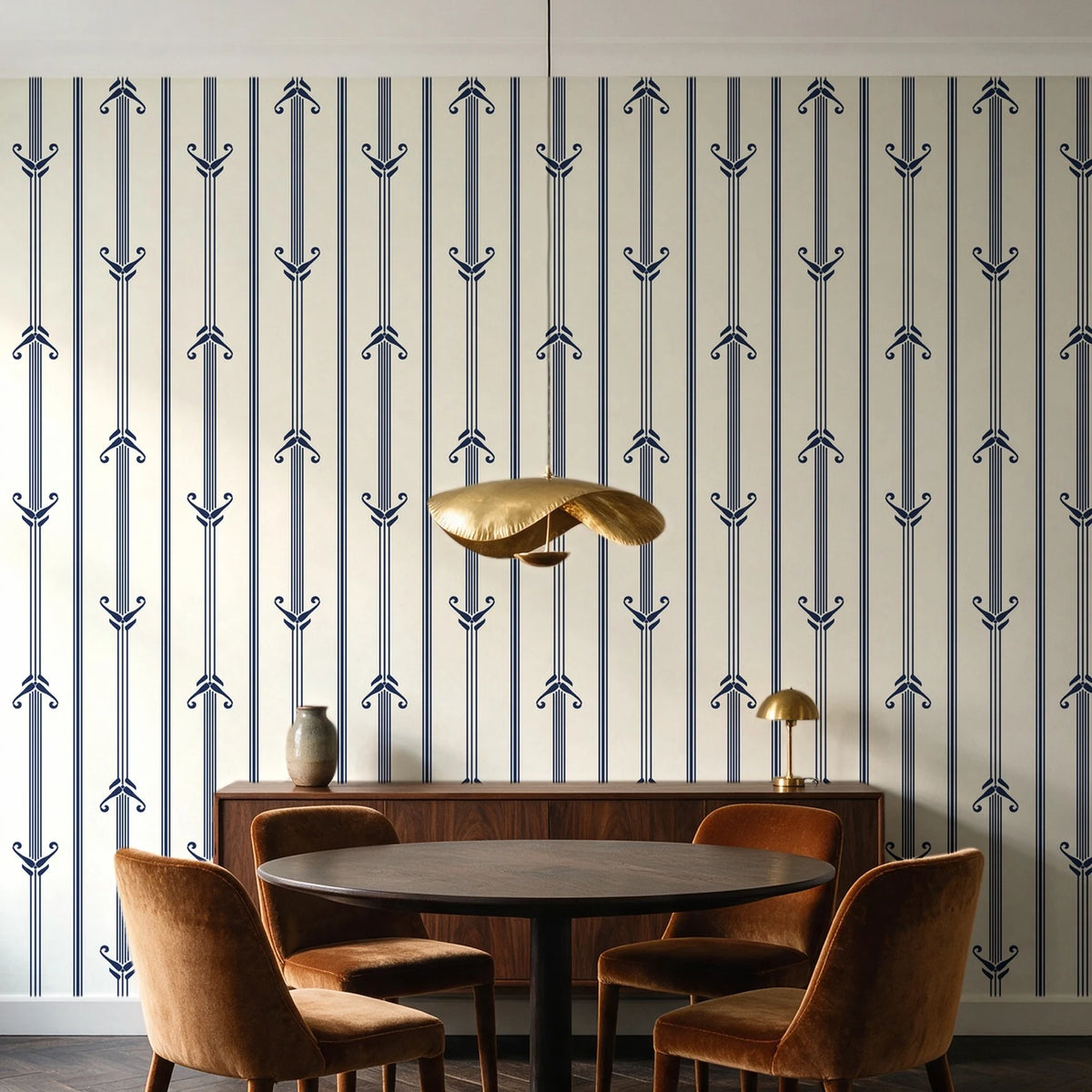 Tranquility Tapestry Midnight art deco stripe wallpaper behind a walnut credenza and round table in an elegant dining room