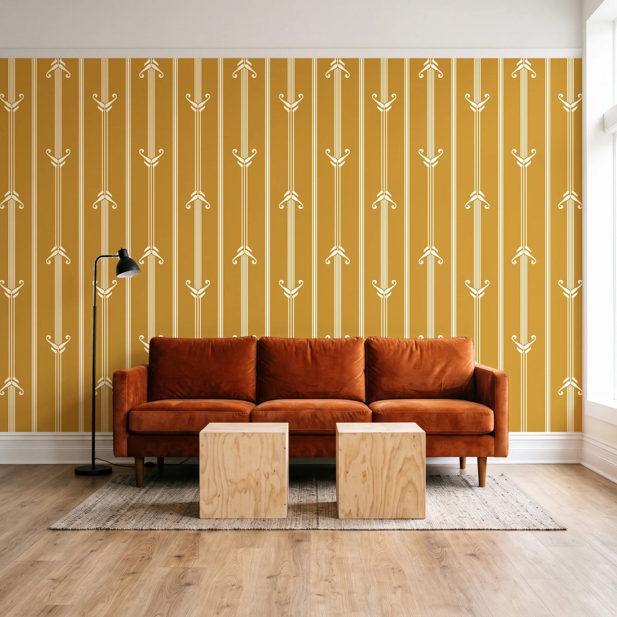 Tranquility Tapestry Saffron art deco stripe wallpaper behind a rust velvet sofa in a bright coworking lounge