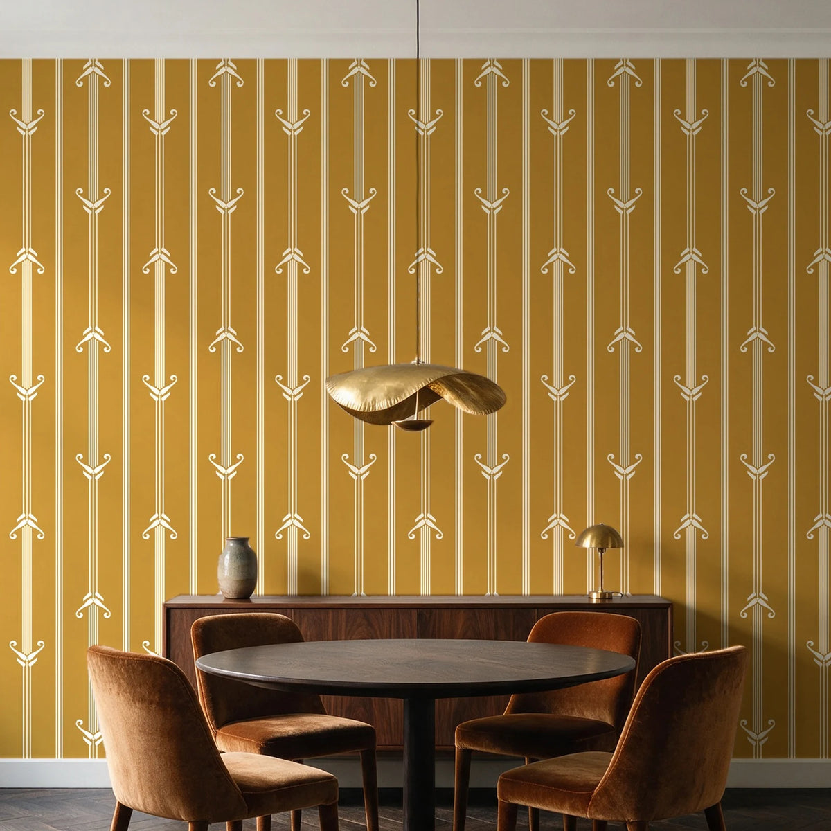 Tranquility Tapestry Saffron art deco stripe wallpaper behind a walnut credenza and round table in an elegant dining room
