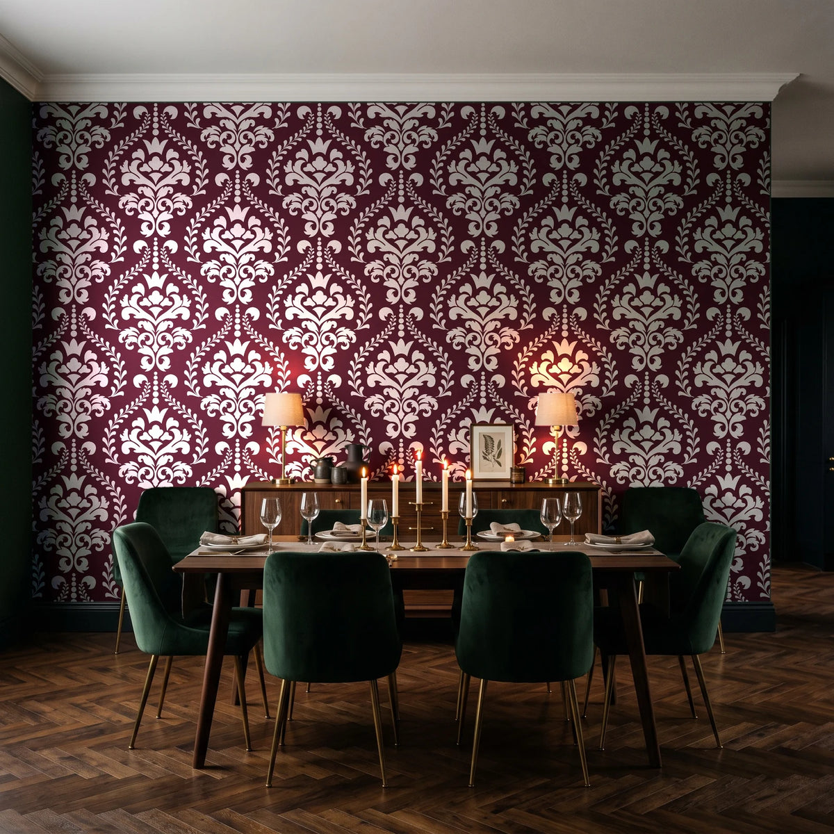 Veiled Botany Oxblood damask wallpaper in a dark moody dining room with a candlelit table