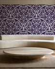 Velvet Vine Serenade Plum damask wallpaper in an elegant living room
