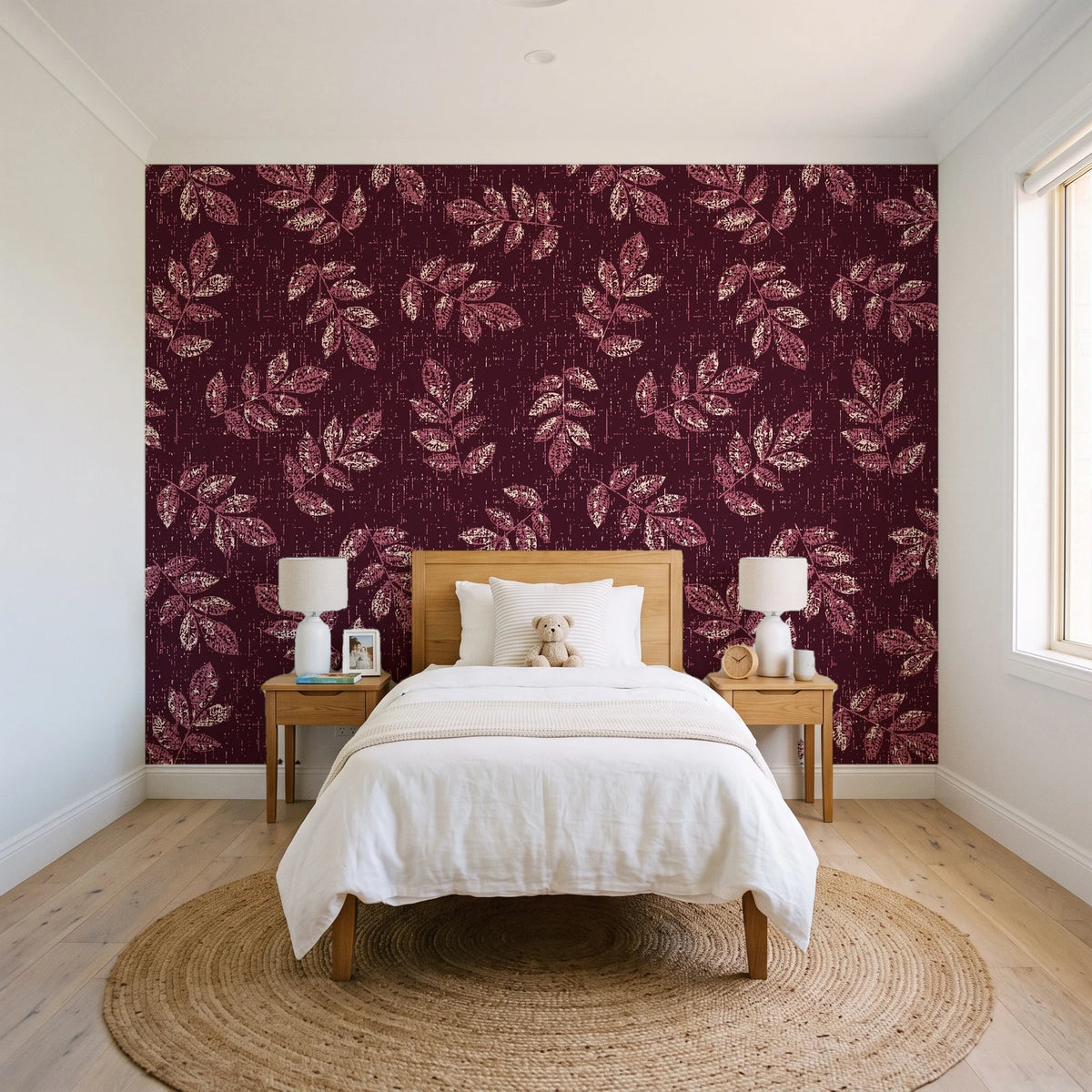 Verdant Scatter Oxblood tossed leaf wallpaper in a bright, cheerful child's bedroom