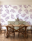 Verdant Scatter Plum tossed leaf wallpaper in a farmhouse dining room with a sage sideboard and rustic trestle table