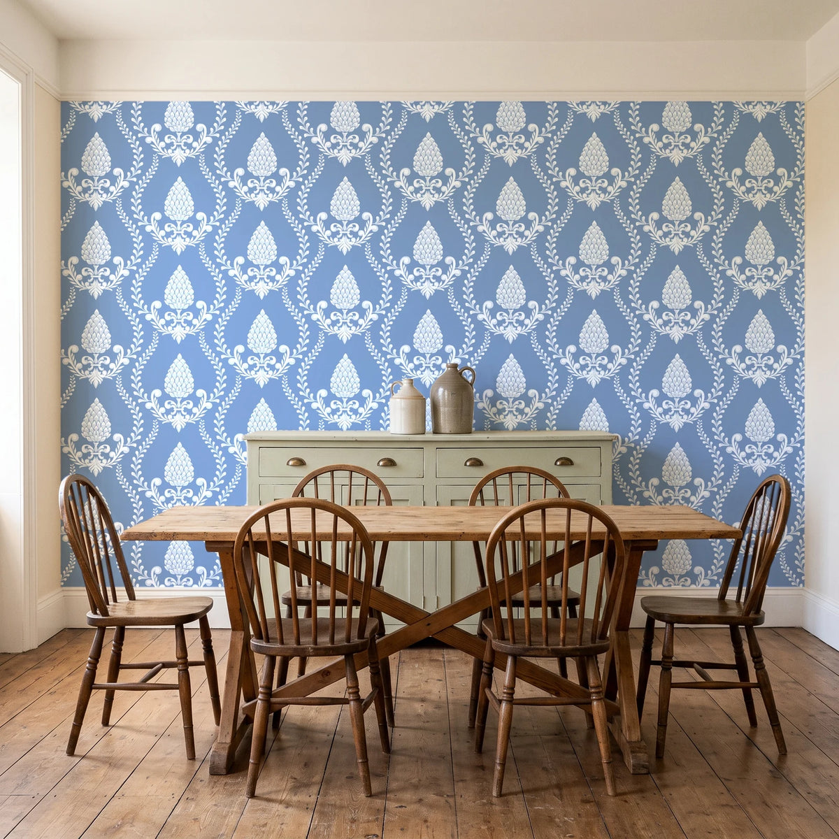 Victorian Vineage Delft vine damask wallpaper in a farmhouse dining room with a sage sideboard and rustic trestle table