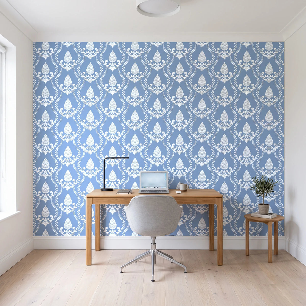 Victorian Vineage Delft vine damask wallpaper behind a modern oak desk in a bright home office
