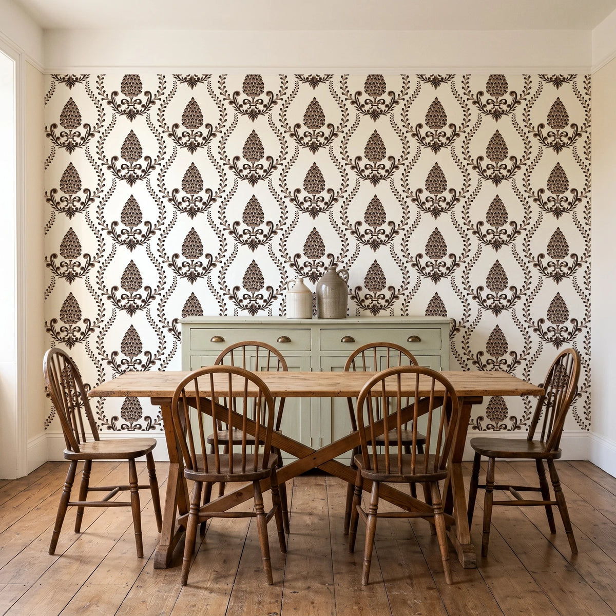 Victorian Vineage Espresso vine damask wallpaper in a farmhouse dining room with a sage sideboard and rustic trestle table