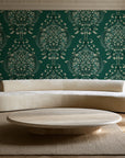 Vintage Eden Emerald damask wallpaper in an elegant living room