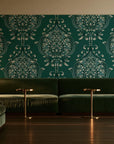 Vintage Eden Emerald damask wallpaper in an intimate luxury cocktail lounge