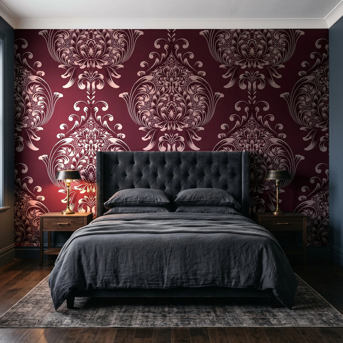 Vintage Eden Oxblood damask wallpaper behind a tufted headboard in a dark, moody bedroom