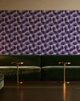 Wild Palm Plum palm wallpaper in an intimate luxury cocktail lounge