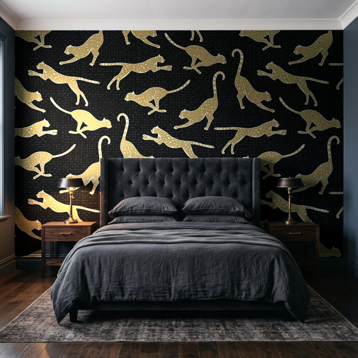 Wild Stride Noir cheetah wallpaper behind a tufted headboard in a dark, moody bedroom