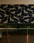 Wild Stride Noir cheetah wallpaper in an intimate luxury cocktail lounge