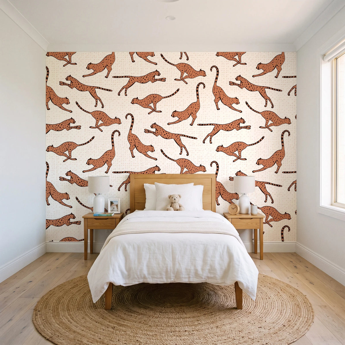 Wild Stride Terracotta cheetah wallpaper in a bright, cheerful child's bedroom