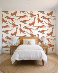 Wild Stride Terracotta cheetah wallpaper in a bright, cheerful child's bedroom