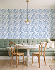 Willow Trace Indigo willow vine wallpaper as a feature wall in a sunlit breakfast nook