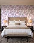 Willow Trace Rose willow vine wallpaper behind the headboard of a king bed in a contemporary hotel guest room