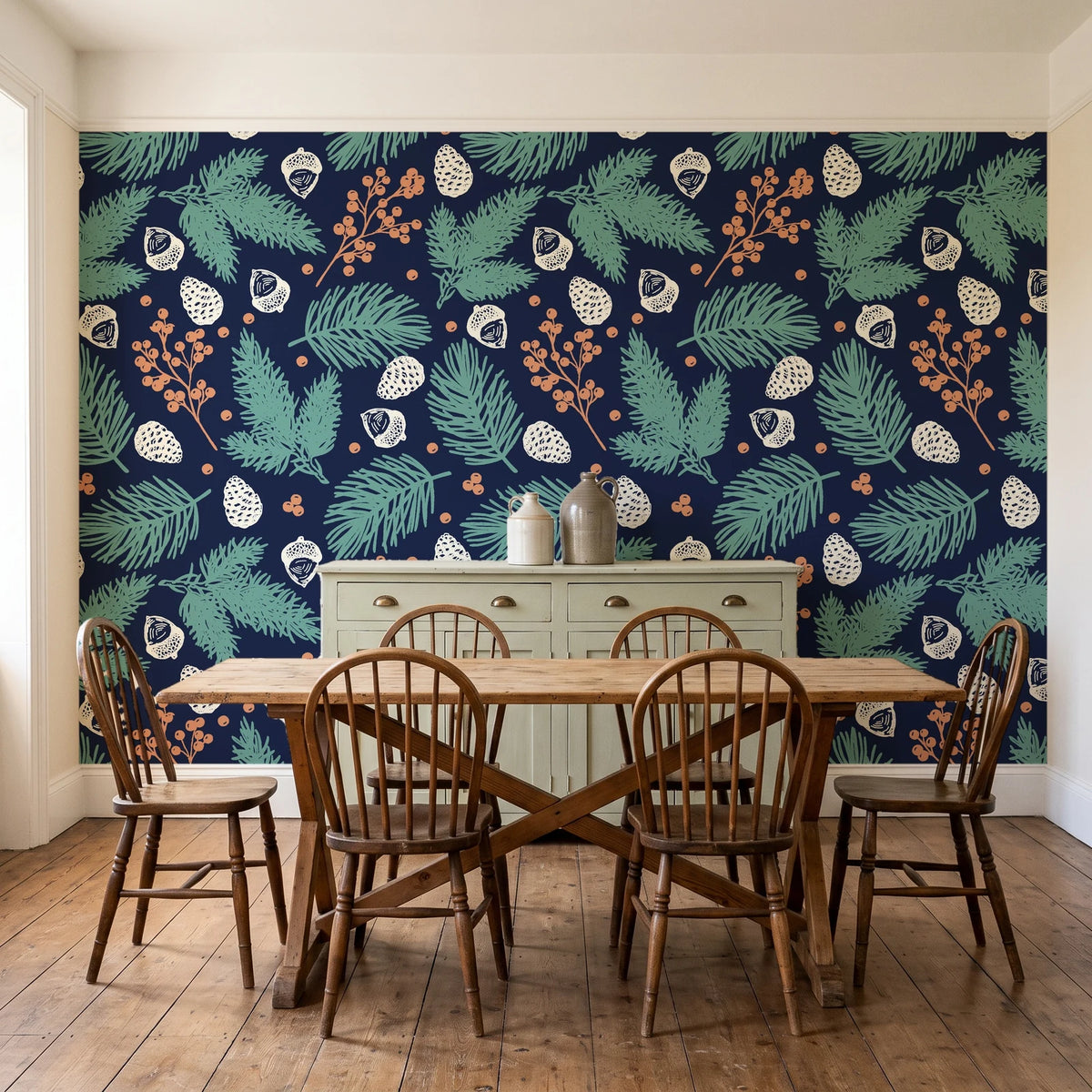 Winter Forage Midnight pine bough and berry wallpaper in a farmhouse dining room with a sage sideboard and rustic trestle table