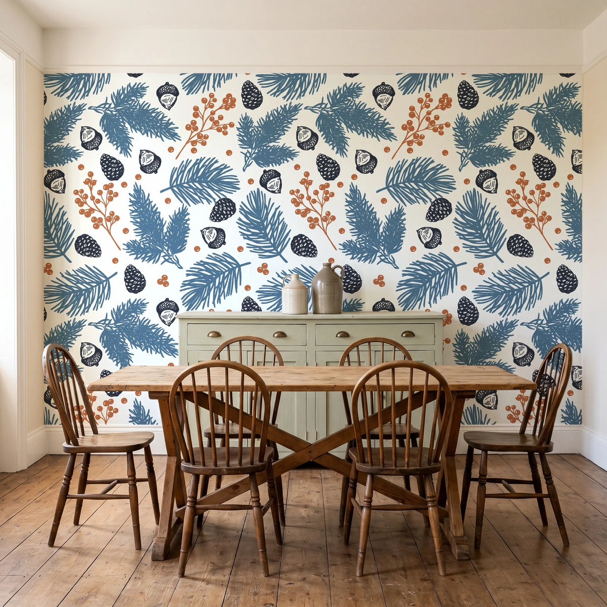 Winter Forage Slate pine bough and berry wallpaper in a farmhouse dining room with a sage sideboard and rustic trestle table