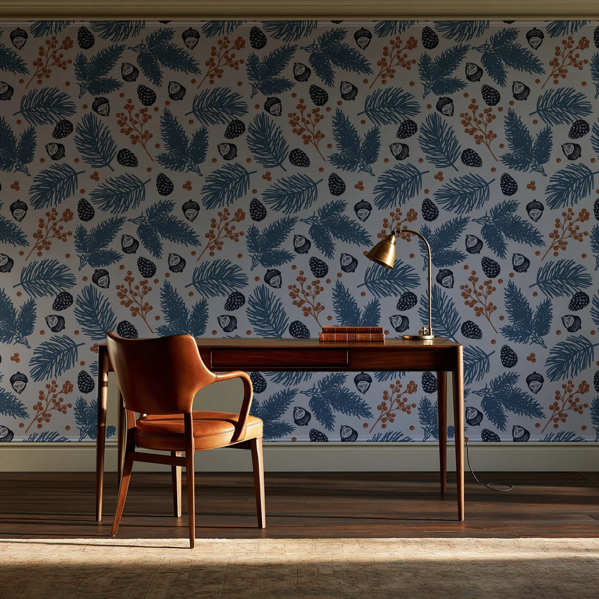 Winter Forage Slate pine bough and berry wallpaper as a feature wall in a home study