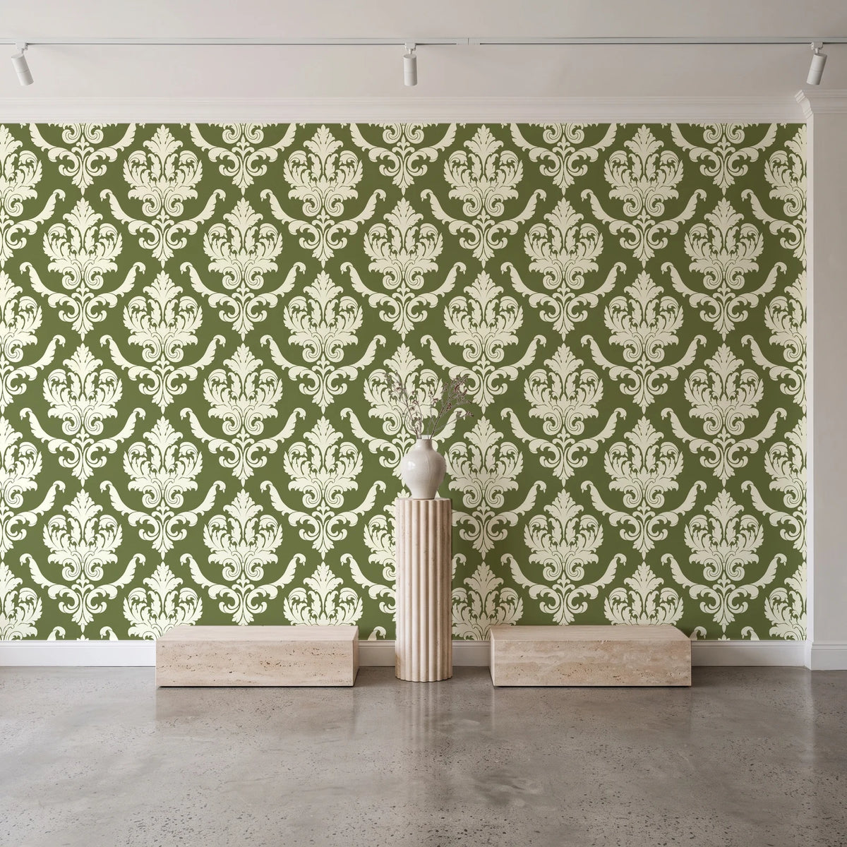 Woodland Blossom Veil Olive damask wallpaper behind a travertine pedestal and vase in a minimal boutique