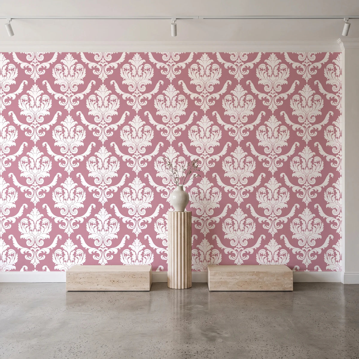 Woodland Blossom Veil Rose damask wallpaper behind a travertine pedestal and vase in a minimal boutique