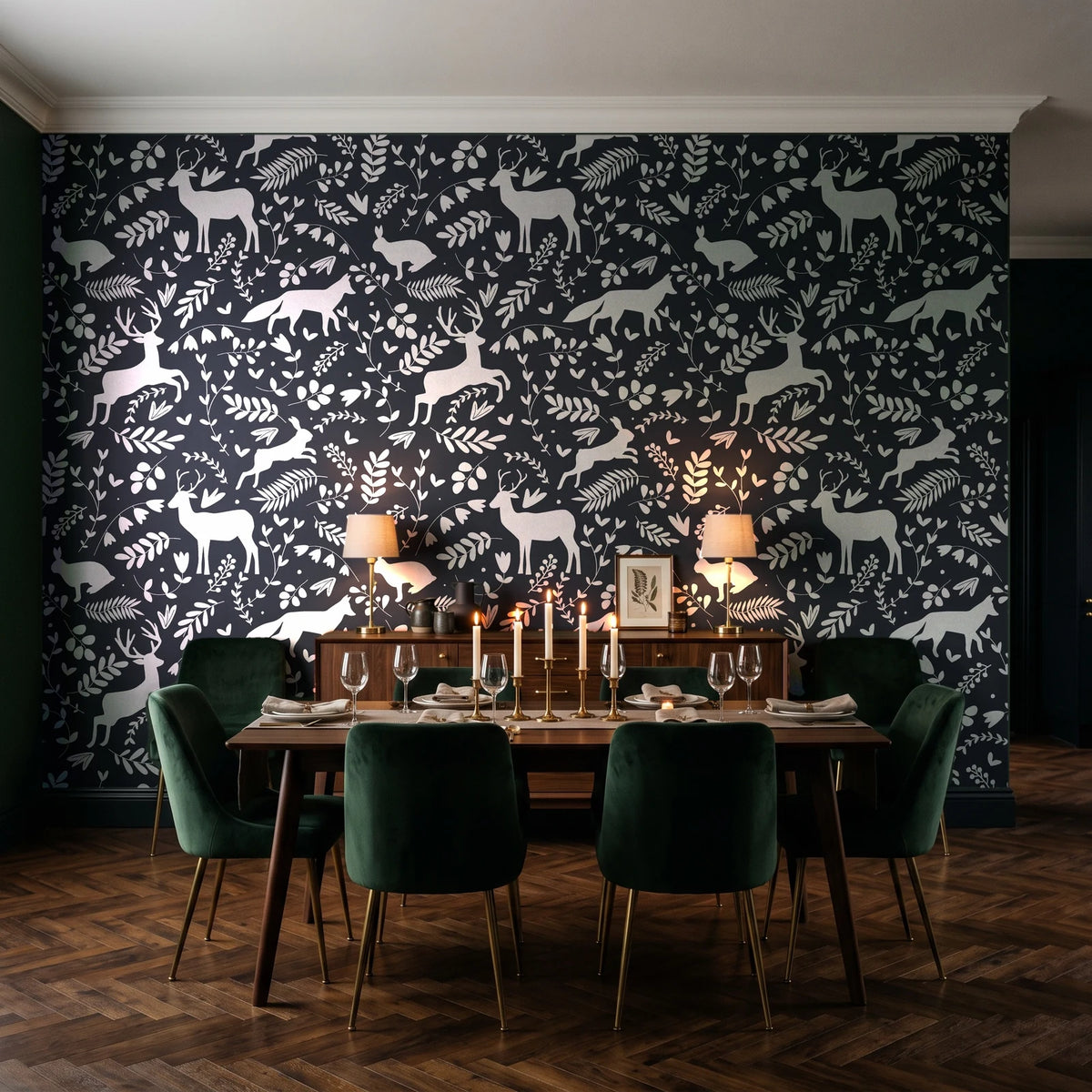 Woodland Hush Charcoal woodland animal wallpaper in a dark moody dining room with a forest-green wall and candlelit table