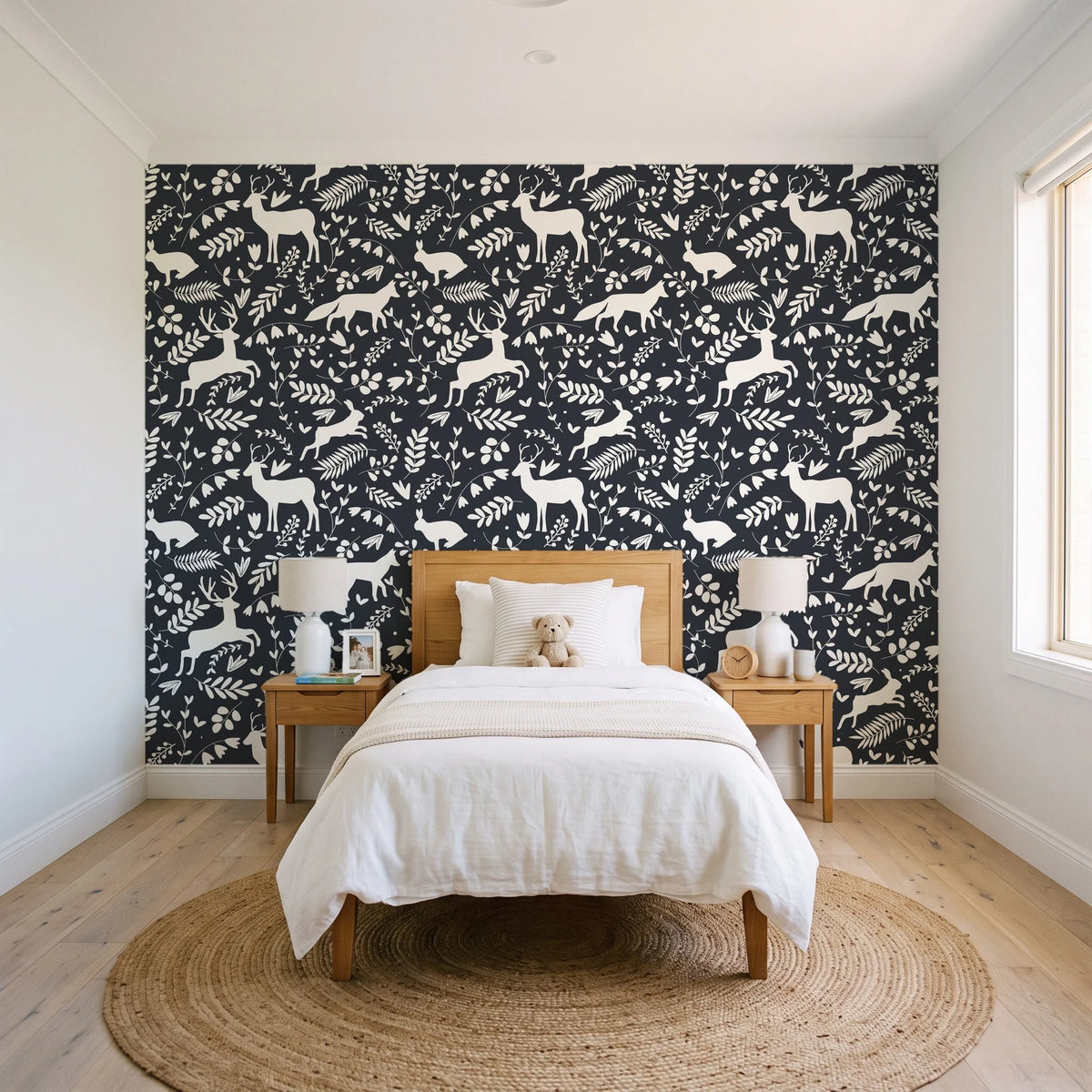 Woodland Hush Charcoal woodland animal wallpaper in a bright, cheerful child's bedroom