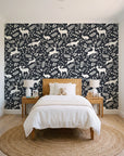 Woodland Hush Charcoal woodland animal wallpaper in a bright, cheerful child's bedroom