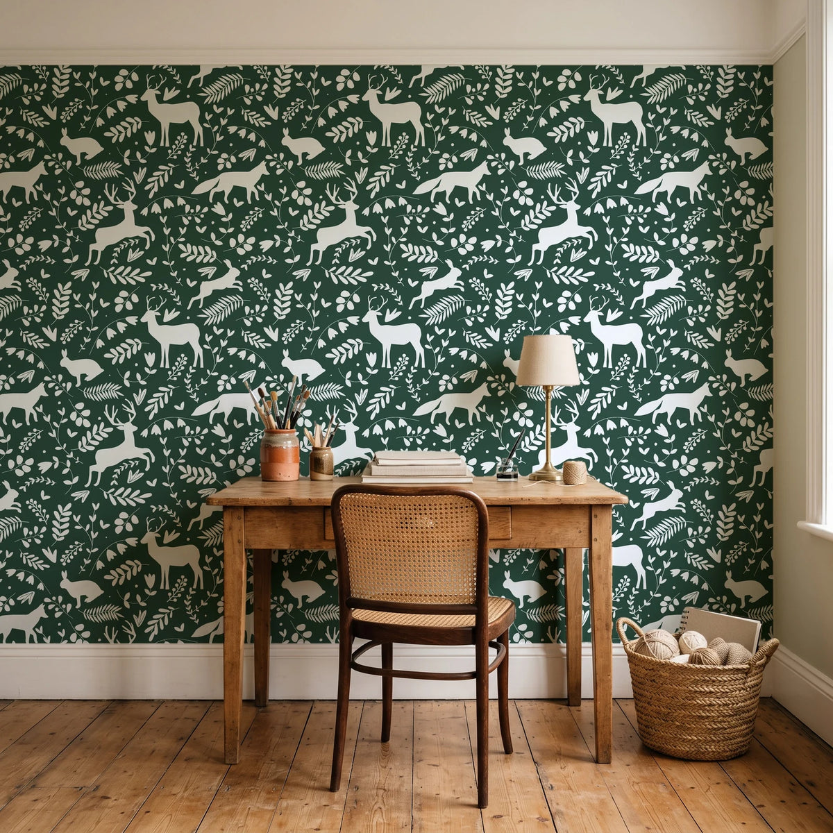 Woodland Hush Forest woodland animal wallpaper behind a vintage writing desk in a cozy craft-room home office