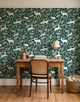 Woodland Hush Forest woodland animal wallpaper behind a vintage writing desk in a cozy craft-room home office