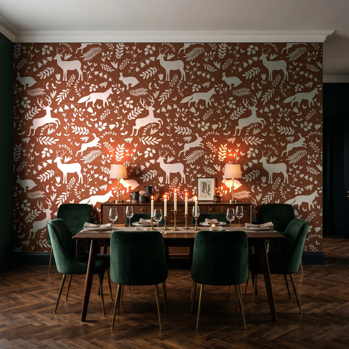 Woodland Hush Rust woodland animal wallpaper in a dark moody dining room with a forest-green wall and candlelit table